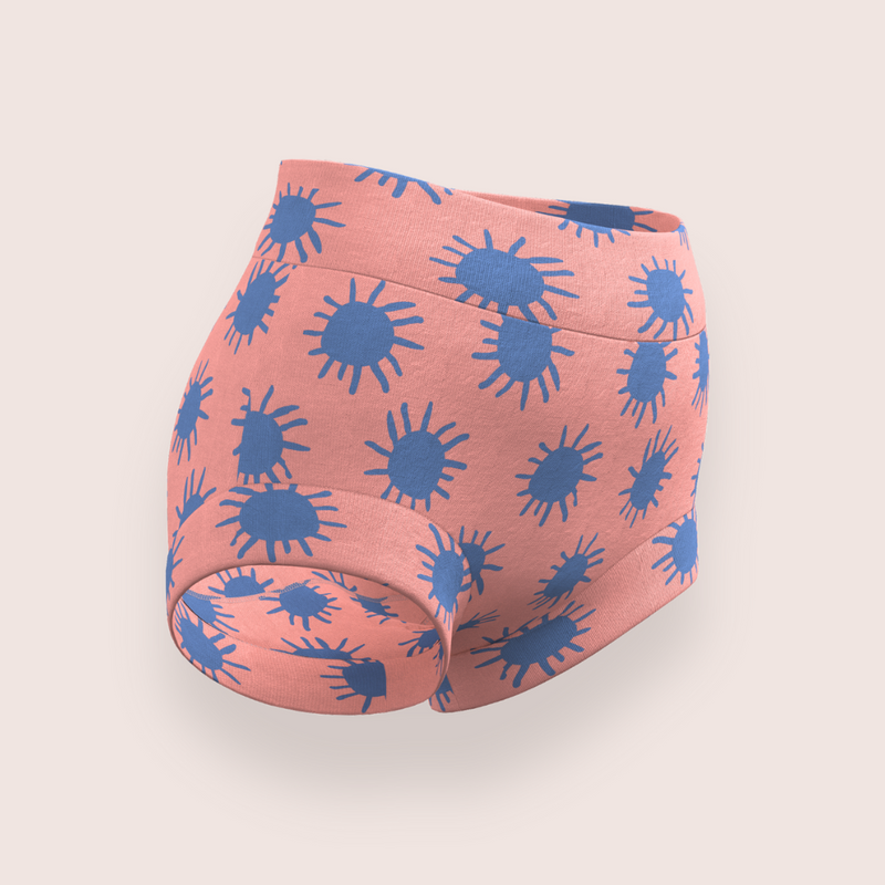 Girls brief style underwear in coral with blue suns